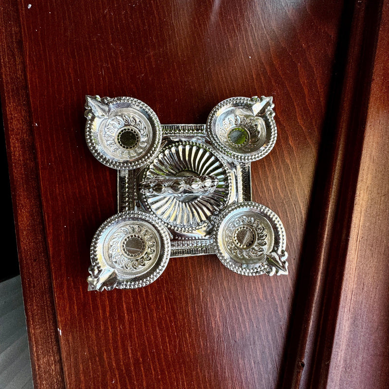 The 5 pcs German Silver Diya Return Gift in Net wrap